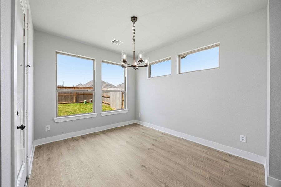 Spacious, unfurnished interior of a new home in Sunterra 50s, Katy (Image 21).