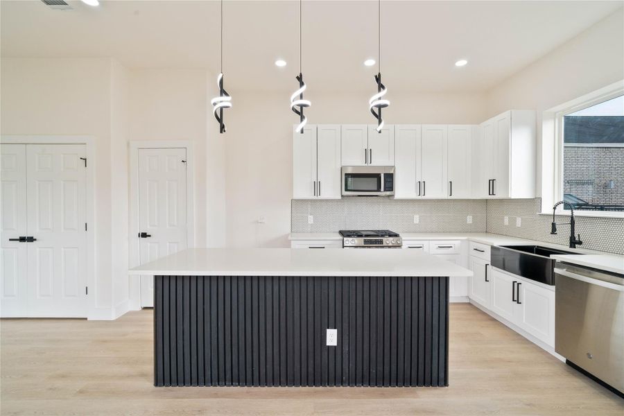 Beautifully designed space with tons of upgraded finishes