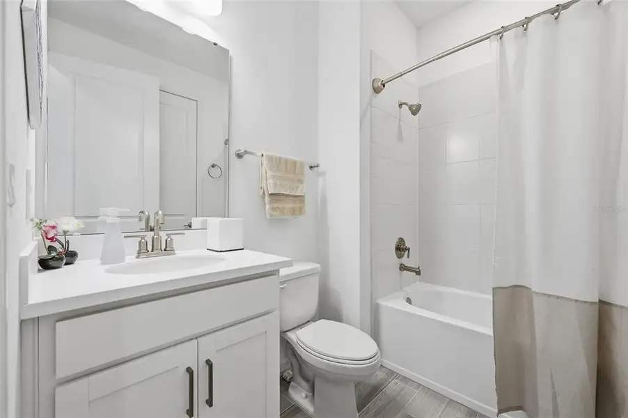 Furnished interior view inside a new home in Westview Community Group Page, Kissimmee (Image 14).