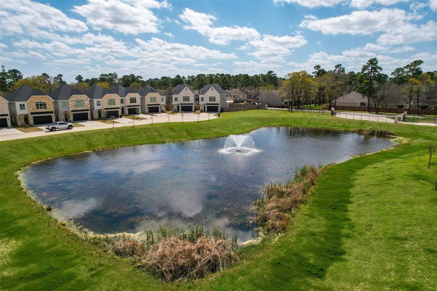 Enjoy peace of mind as you stroll through this gated community, where safety and serenity go hand in hand. The tranquil pond offers a picturesque backdrop, creating a calming atmosphere perfect for morning walks or relaxing evening strolls.