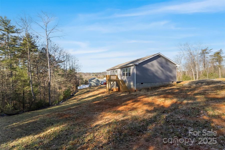 Exterior details and patio area of a home in , Weaverville (Image 25).