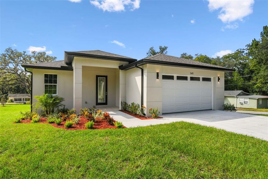 Front exterior of a new home in , Brooksville, FL, highlighting curb appeal (Image 24). Front exterior of a new home in , Brooksville, FL, highlighting curb appeal (Image 24).