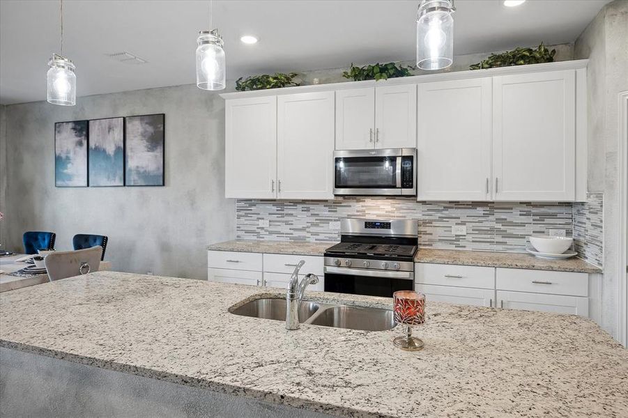 Furnished interior view inside a new home in Whitewing Trails, Princeton (Image 18).