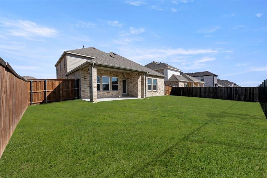 Exterior details and patio area of a home in Grayhawk Addition, Forney (Image 4).