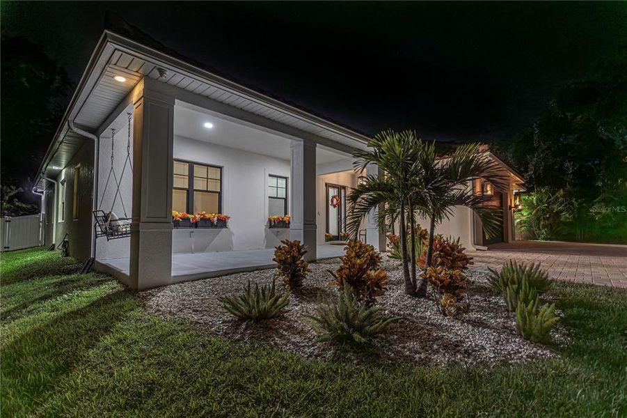 Front exterior of a new home in , Tarpon Springs, FL, highlighting curb appeal (Image 1).