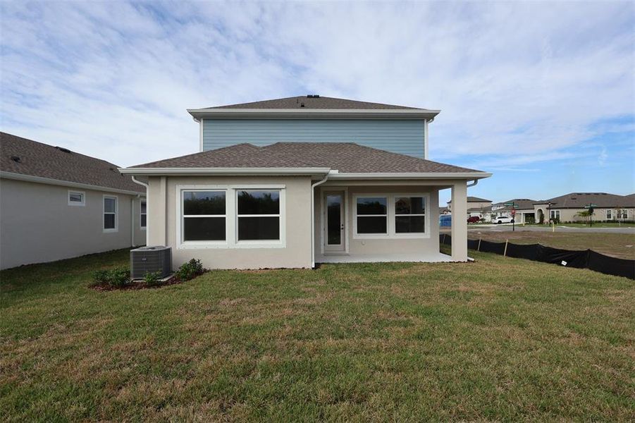 Exterior details and patio area of a home in Waterset Tradition Series, Apollo Beach (Image 28).