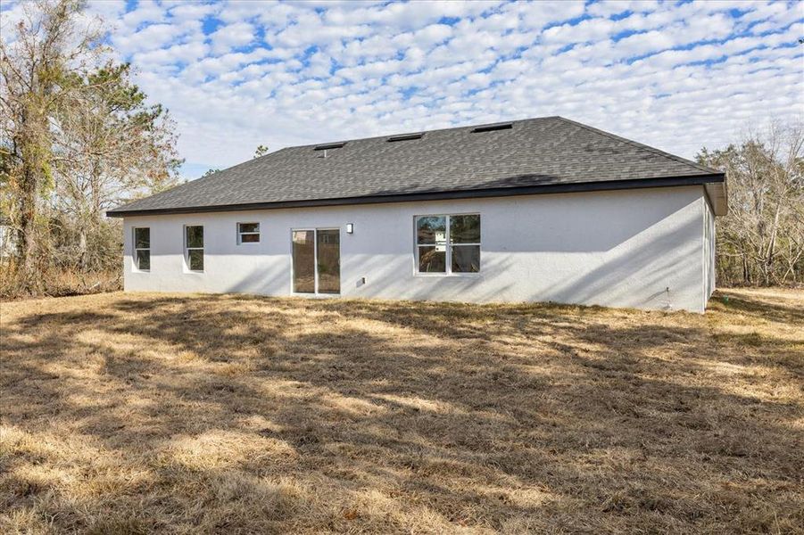 Exterior details and patio area of a home in , Ocala (Image 4).
