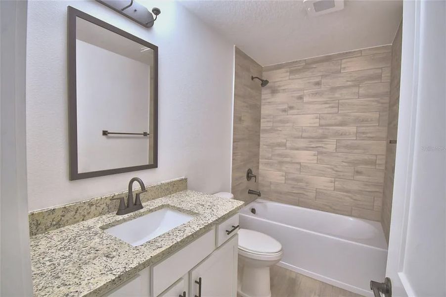 Furnished interior view inside a new home in Lake Juliana Estates, Auburndale (Image 8).