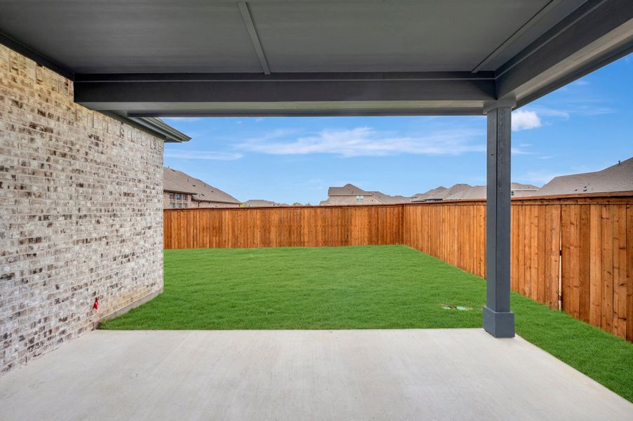 Exterior details and patio area of a home in Creekshaw – Classic, Royse City (Image 3).