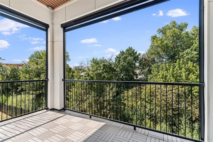 2nd floor balcony with auto shades and accent ceiling treatment, boasting amazing views!