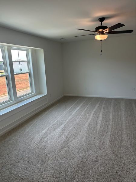 Plush carpeting and well-lit interiors define this Plush carpeting and well-lit interiors define this