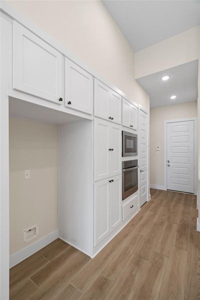 Spacious, unfurnished interior of a new home in Woodson’s Reserve, Spring (Image 24).