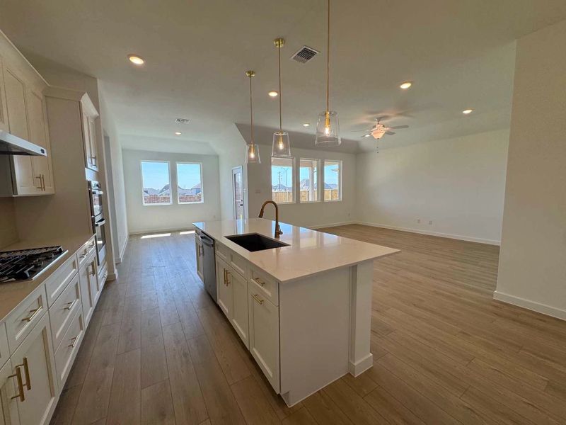 Open Kitchen-Living-Dining Room Construction Progress featuring the Serene Collection