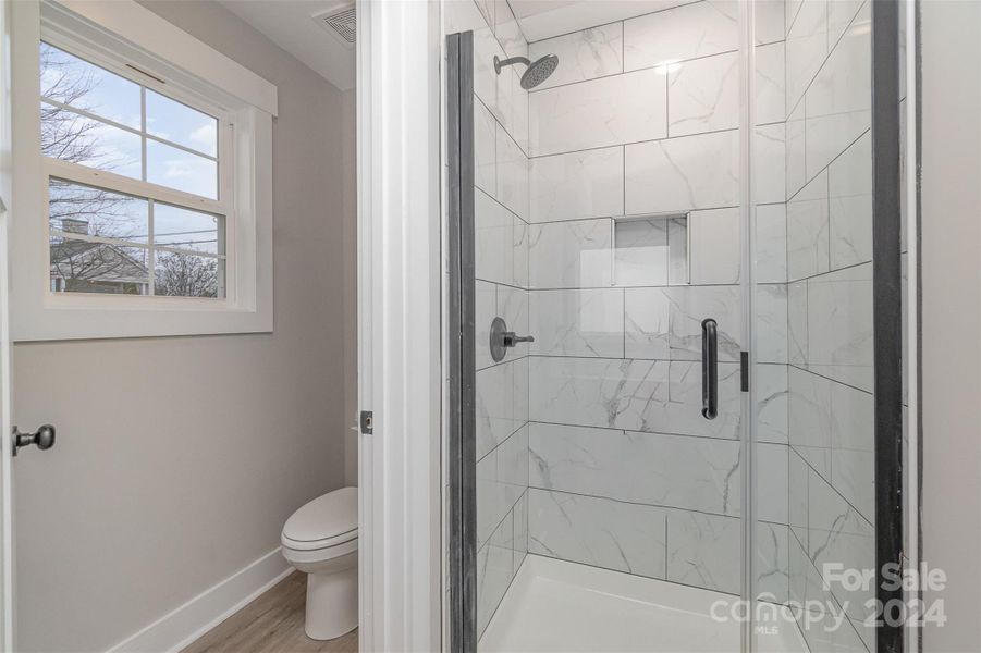 Gorgeous Tiled Walk-in Shower and separate Water Closet