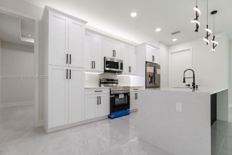 Furnished interior view inside a new home in , Lehigh Acres (Image 15).