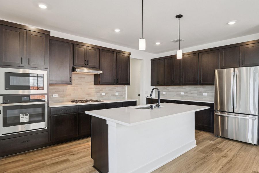 Furnished interior view inside a new home in Lariat, Liberty Hill (Image 6). Furnished interior view inside a new home in Lariat, Liberty Hill (Image 6).