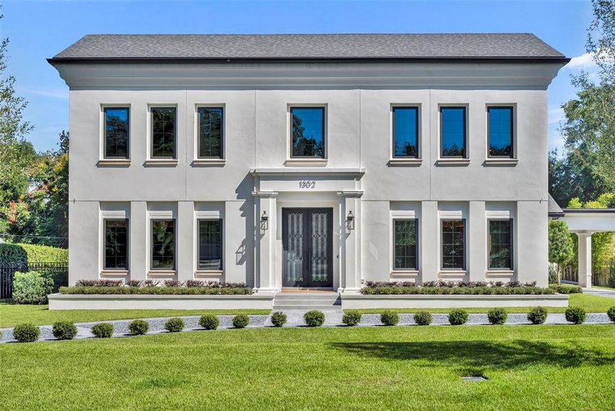 Front exterior of a new home in , Winter Park, FL, highlighting curb appeal (Image 2).