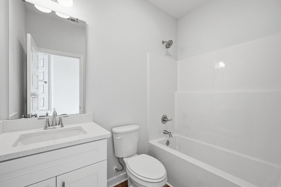 Furnished interior view inside a new home in McCarthy Estates, Defuniak Springs (Image 3).