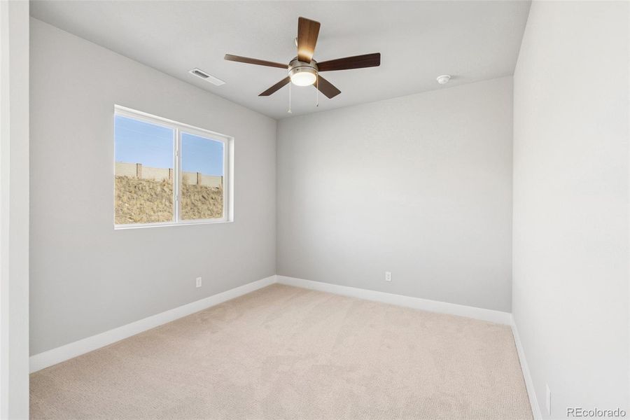 Spacious, unfurnished interior of a new home in Trailside at Cottonwood Creek, Colorado Springs (Image 26).