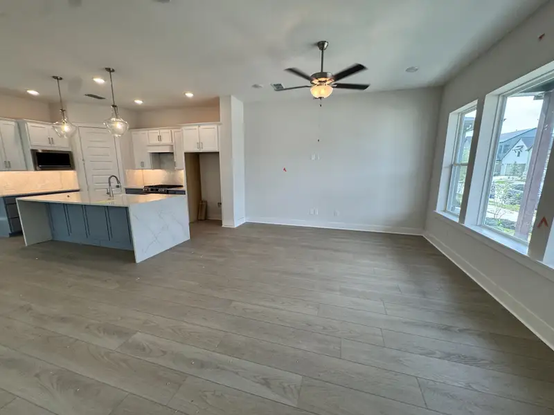 Spacious, unfurnished interior of a new home in Bridgeland Central: Emerald Heights - Cottages Row Collection, Cypress (Image 8).