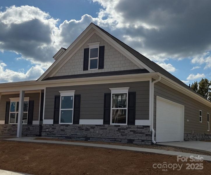 Front exterior of a new home in Cedar Meadows, Monroe, NC, highlighting curb appeal (Image 23).