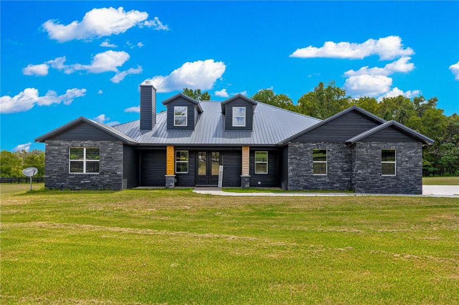 Front exterior of a new home in , Ocala, FL, highlighting curb appeal (Image 27). Front exterior of a new home in , Ocala, FL, highlighting curb appeal (Image 27).