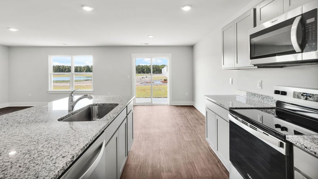 Furnished interior view inside a new home in Sidbury Station, Castle Hayne (Image 6).