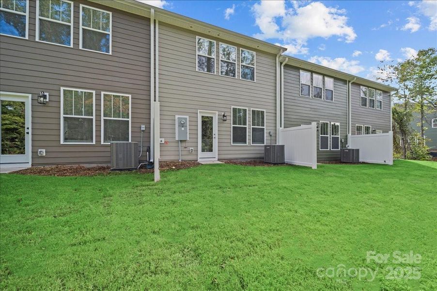 Exterior details and patio area of a home in Clayton Crossing, Arden (Image 2). Exterior details and patio area of a home in Clayton Crossing, Arden (Image 2).