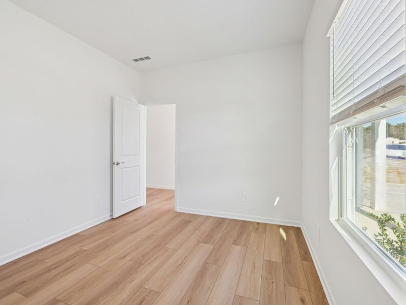 Spacious, unfurnished interior of a new home in Watkins Glen, Raleigh (Image 17).