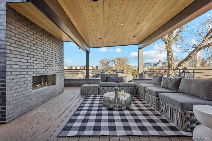 Covered Rooftop Deck with Gas Fireplace