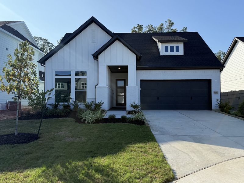 Front exterior of a new home in ARTAVIA - Enclave Collection, Conroe, TX, highlighting curb appeal (Image 1). Front exterior of a new home in ARTAVIA - Enclave Collection, Conroe, TX, highlighting curb appeal (Image 1).