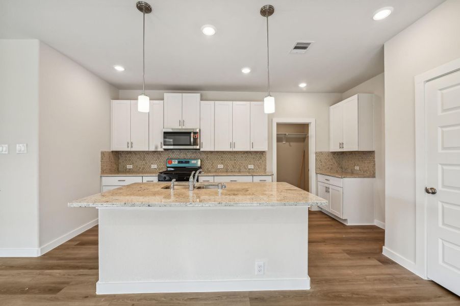 Photo is not of the actual home, but is an inspirational photo of builder’s model home and may depict options, furnishings, and/or decorator features that are not included