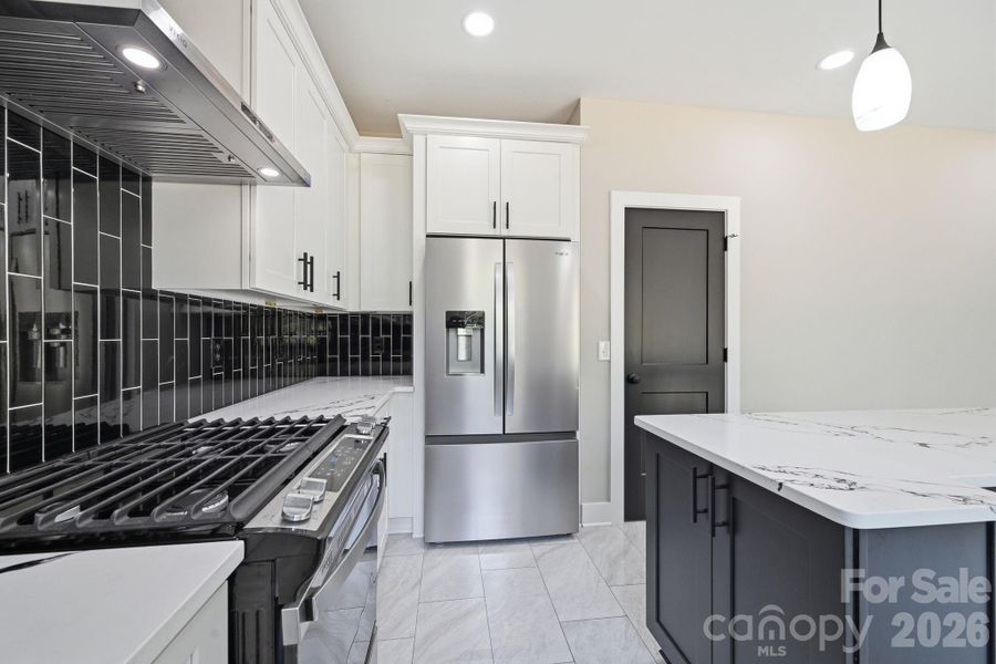 Furnished interior view inside a new home in , Huntersville (Image 10).