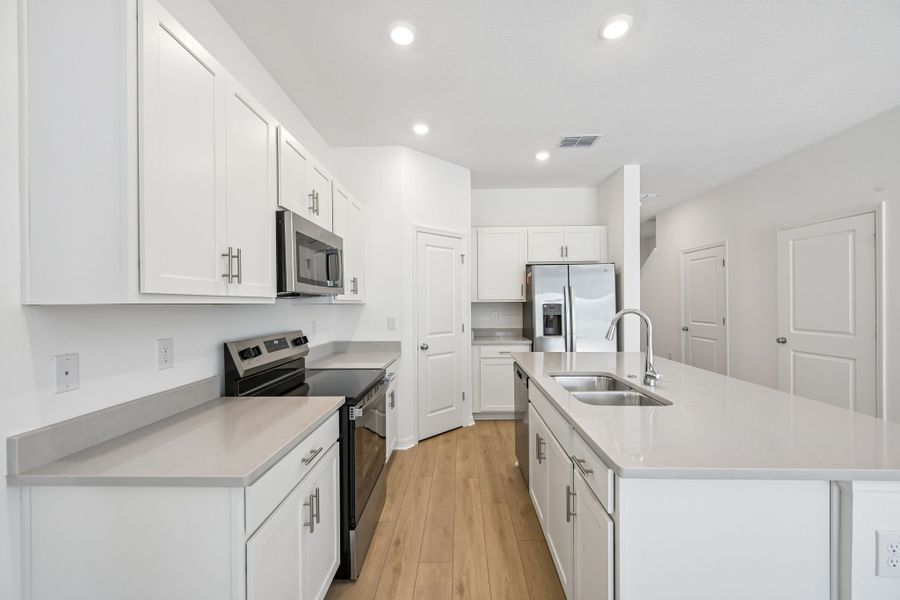 Furnished interior view inside a new home in The Towns at Tiburon, Nokomis (Image 4).