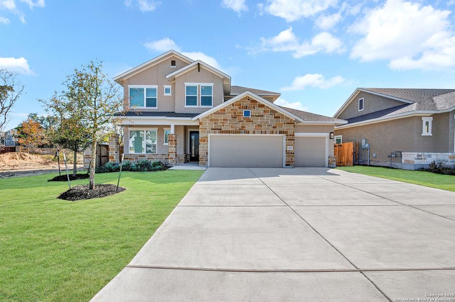 Front exterior of a new home in Davis Ranch 60', San Antonio, TX, highlighting curb appeal (Image 19).
