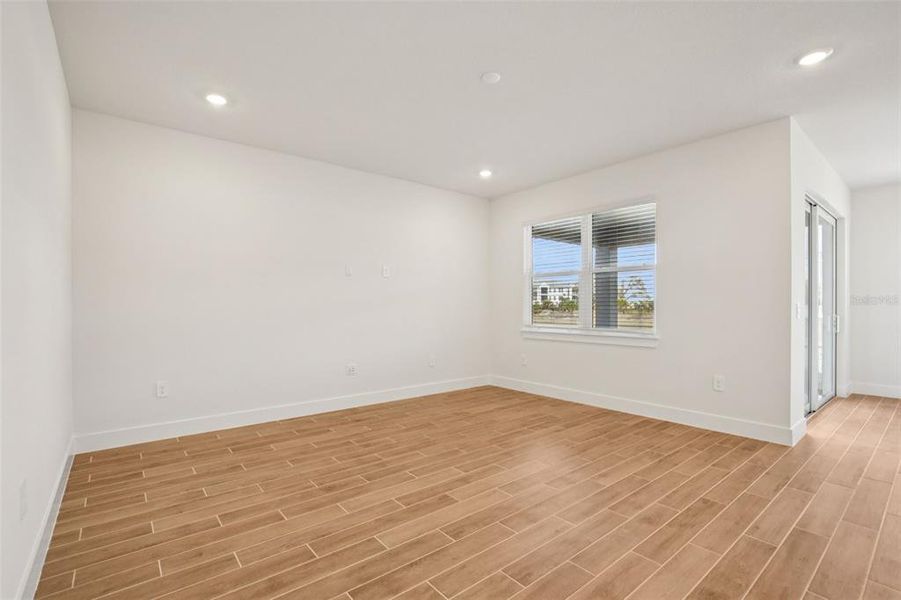 Spacious, unfurnished interior of a new home in Magnolia Bay - Reserve Series, Nokomis (Image 29).