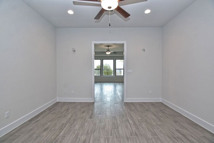 Representative unfurnished interior of a home built from the Avalon by Giddens Homes in Scofield Farms Estates, Georgetown (Image 142).
