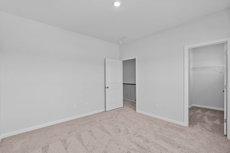 Spacious, unfurnished interior of a new home in Lilah Grove, Summerfield (Image 37).