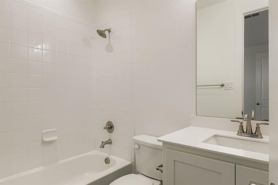 Furnished interior view inside a new home in Reunion 70s, Rhome (Image 3). Furnished interior view inside a new home in Reunion 70s, Rhome (Image 3).