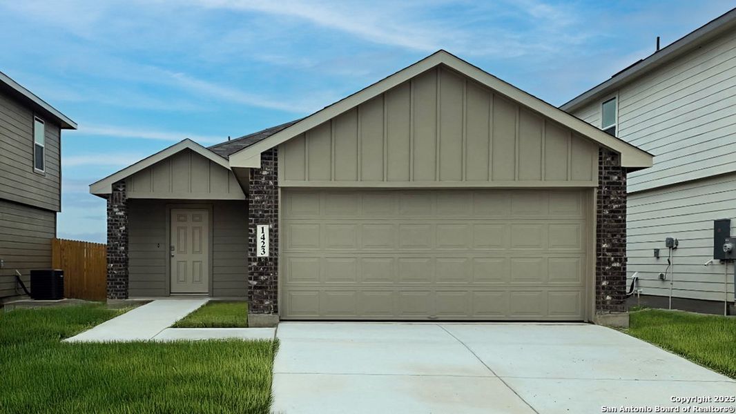 Front exterior of a new home in Sereno Springs, Converse, TX, highlighting curb appeal (Image 1). Front exterior of a new home in Sereno Springs, Converse, TX, highlighting curb appeal (Image 1).