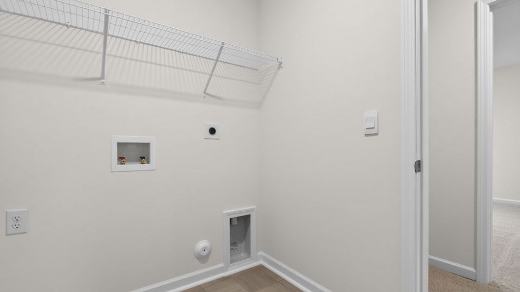 Spacious, unfurnished interior of a new home in Gretchen Pines, West End (Image 33).