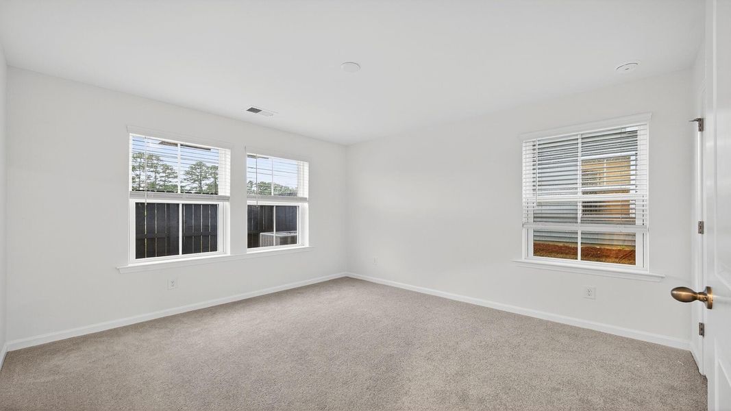 Spacious, unfurnished interior of a new home in Clear Springs Townhomes, North Charleston (Image 19).