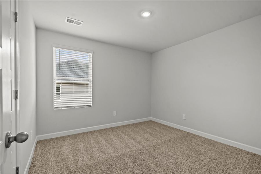 Spacious, unfurnished interior of a new home in Chatham Forest, Duncan (Image 26).