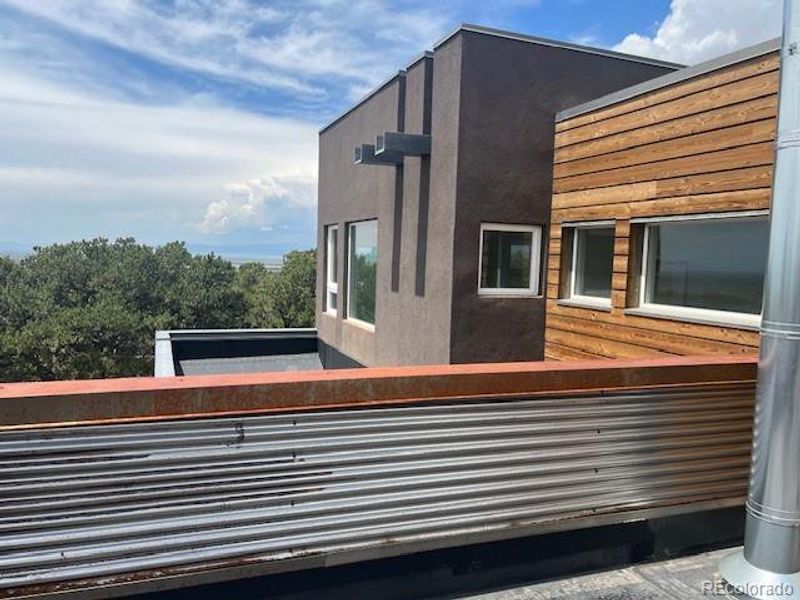 Exterior details and patio area of a home in , Crestone (Image 2). Exterior details and patio area of a home in , Crestone (Image 2).