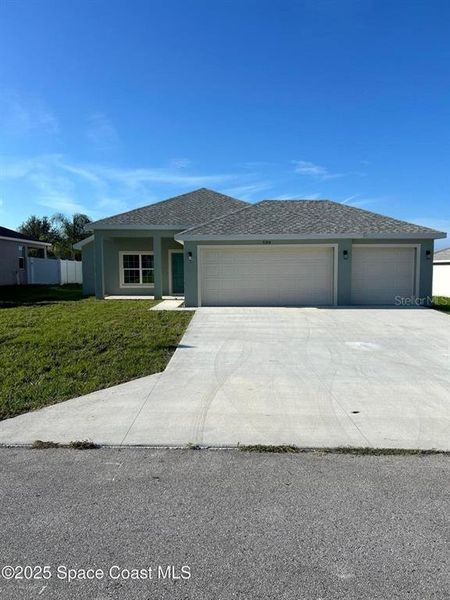Front exterior of a new home in , Ocala, FL, highlighting curb appeal (Image 1).