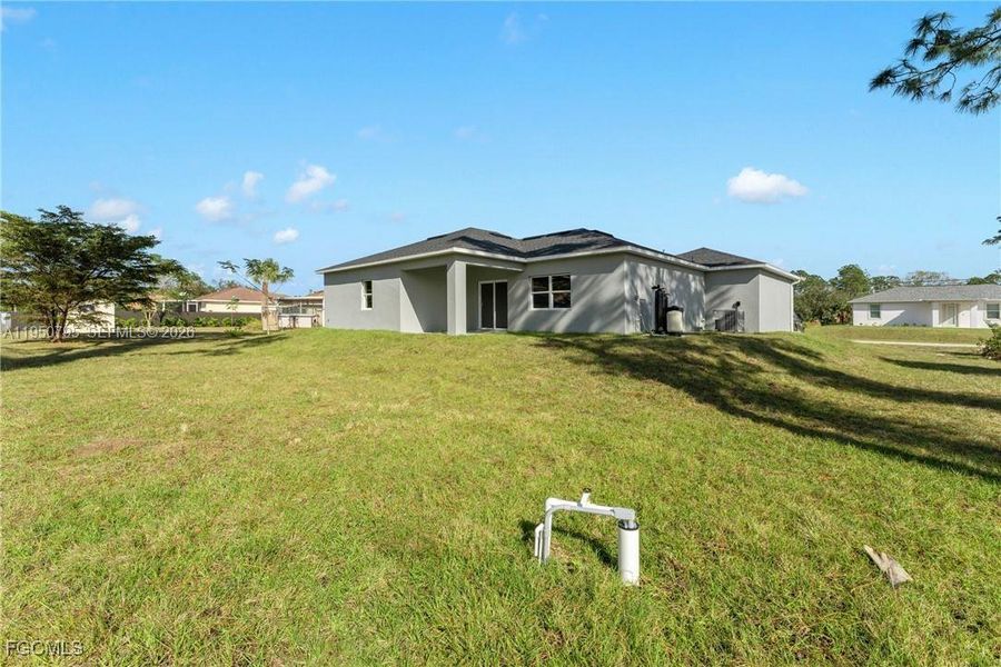 Exterior details and patio area of a home in , Lehigh Acres (Image 15).