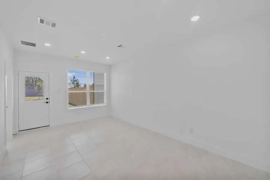 Representative unfurnished interior of a home built from the Margaux by Chesmar Homes in Bridgeland Chateau, Cypress (Image 39).