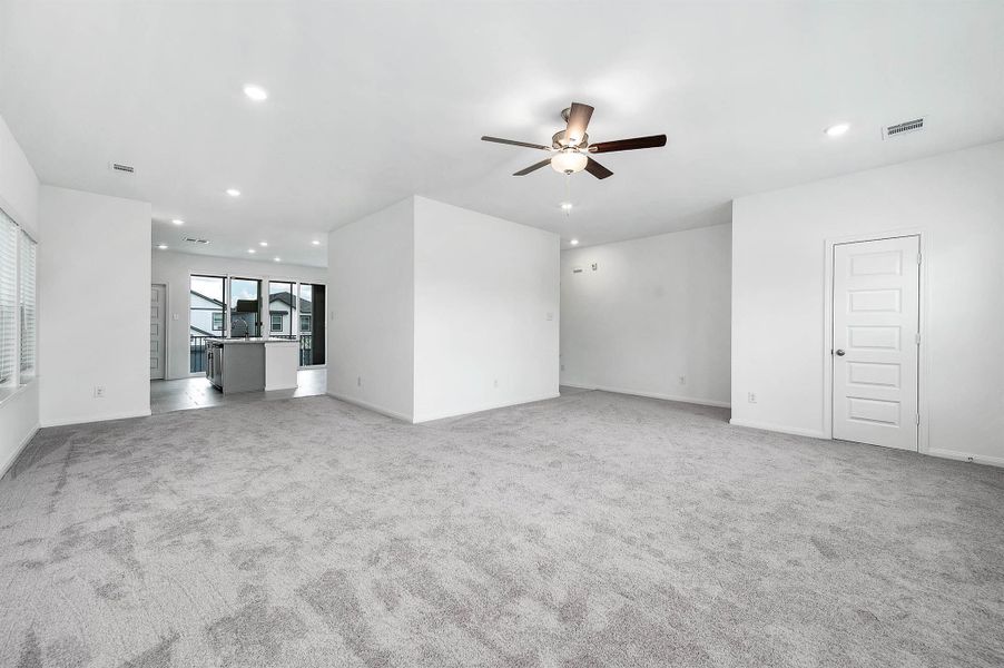 Spacious open-concept living space with easy access to the kitchen. Spacious open-concept living space with easy access to the kitchen.
