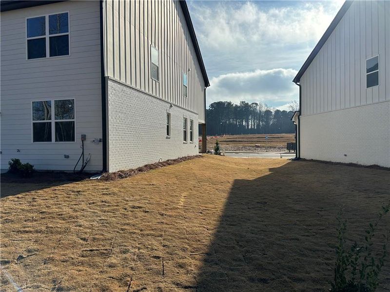 Exterior details and patio area of a home in Millstone at Mundy Mill, Gainesville (Image 24).