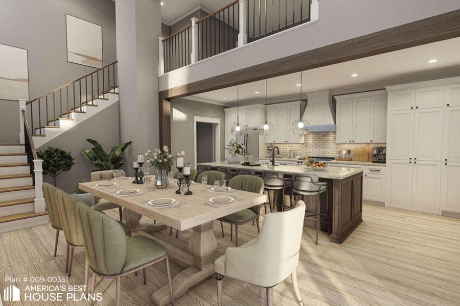 Dining area with light wood-style flooring, a high ceiling, and recessed lighting
